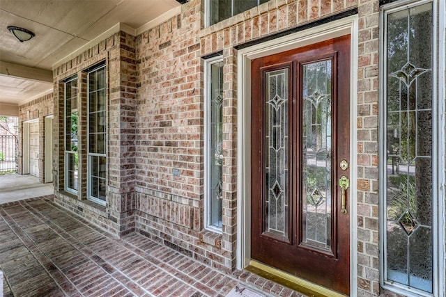22806 Rachels Manor Dr, Katy, TX 77494 - doorway to property featuring brick siding and a porch
