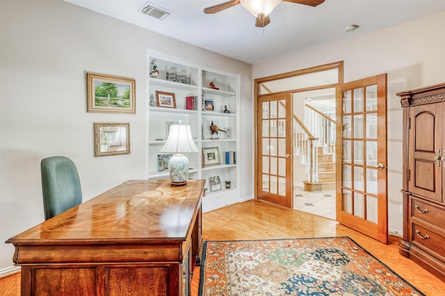 22806 Rachels Manor Dr, Katy, TX 77494 - office featuring french doors, ceiling fan, light wood finished floors, and built in features