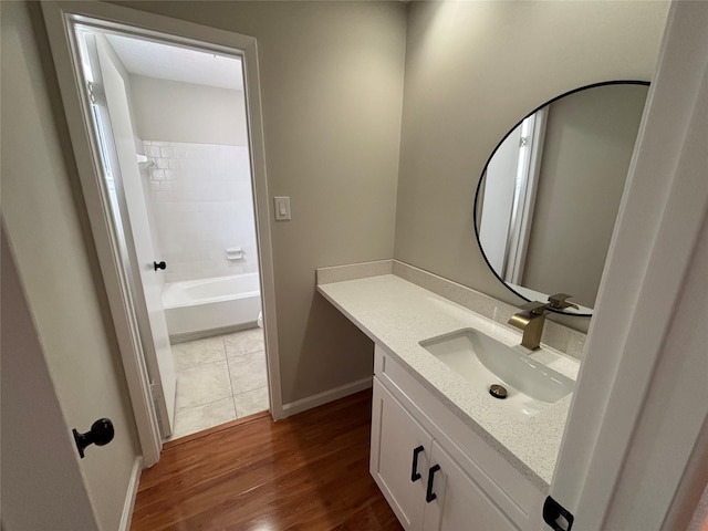 10719 Bellfair Dr, Houston, TX 77072 - full bath featuring vanity and wood finished floors