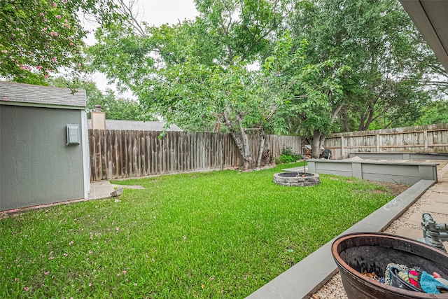 3407 Hillstone Dr, Sugar Land, TX 77479 - fenced backyard with a fire pit and a sink