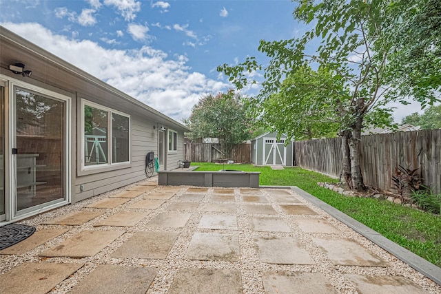 3407 Hillstone Dr, Sugar Land, TX 77479 - fenced backyard with a patio area and a storage shed