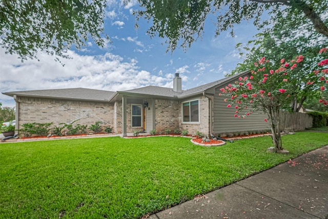 3407 Hillstone Dr, Sugar Land, TX 77479 - ranch-style home with brick siding and a chimney