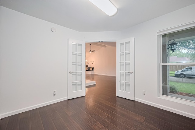 3407 Hillstone Dr, Sugar Land, TX 77479 - empty room with french doors, dark wood finished floors, and a smoke detector