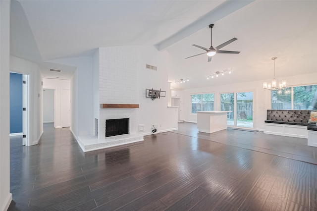 3407 Hillstone Dr, Sugar Land, TX 77479 - unfurnished living room featuring ceiling fan, a chandelier, dark wood-style floors, a fireplace, and beam ceiling