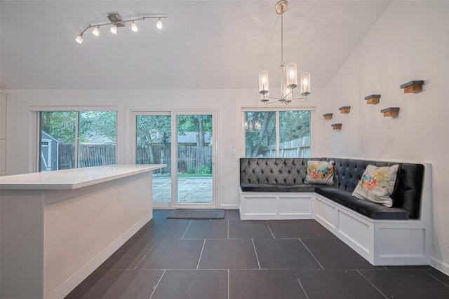3407 Hillstone Dr, Sugar Land, TX 77479 - unfurnished sunroom featuring vaulted ceiling and a chandelier