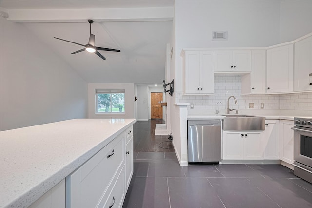 3407 Hillstone Dr, Sugar Land, TX 77479 - kitchen with appliances with stainless steel finishes, tasteful backsplash, a ceiling fan, and dark tile patterned floors