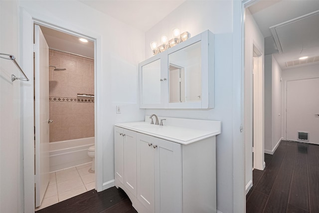 3407 Hillstone Dr, Sugar Land, TX 77479 - full bath featuring vanity, wood finished floors, and bathing tub / shower combination