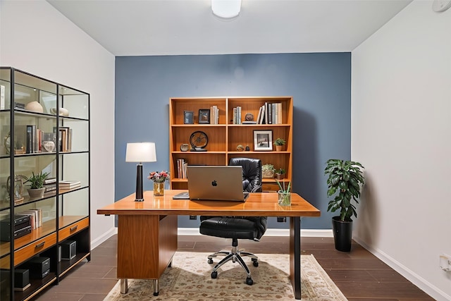 3407 Hillstone Dr, Sugar Land, TX 77479 - home office featuring baseboards and dark wood finished floors