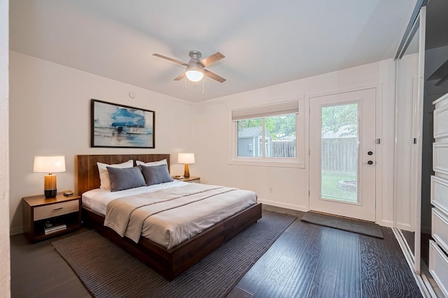 3407 Hillstone Dr, Sugar Land, TX 77479 - bedroom featuring access to exterior, dark wood-style floors, and a ceiling fan