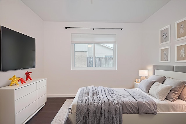 3407 Hillstone Dr, Sugar Land, TX 77479 - bedroom with dark wood-type flooring and baseboards