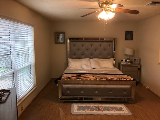 6203 Gladewell Dr, Houston, TX 77072 - bedroom featuring wood finished floors and ceiling fan
