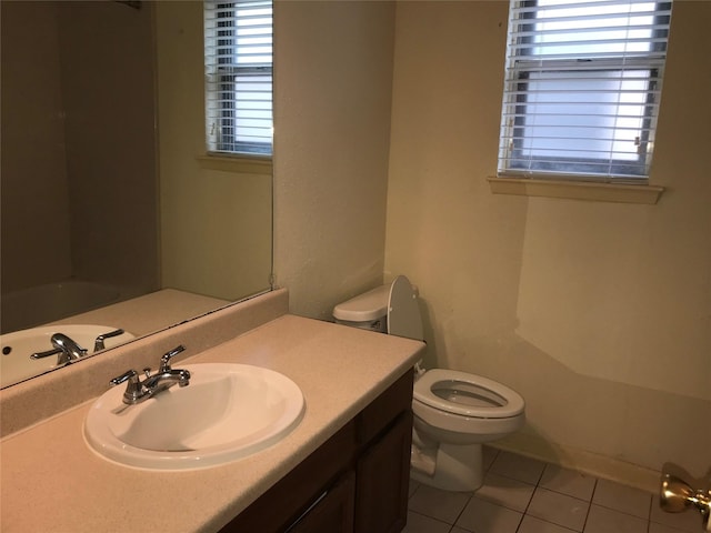 6203 Gladewell Dr, Houston, TX 77072 - bathroom featuring tile patterned flooring, plenty of natural light, and vanity