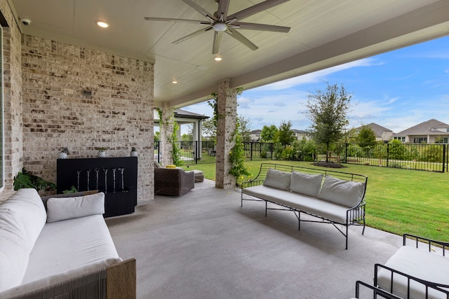 11111 Heartleaf Aster Way, Cypress, TX 77433 - fenced backyard featuring outdoor lounge area, a patio, and ceiling fan