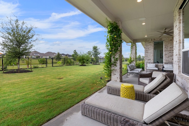 11111 Heartleaf Aster Way, Cypress, TX 77433 - fenced backyard with a ceiling fan, a patio area, and an outdoor living space