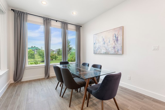 11111 Heartleaf Aster Way, Cypress, TX 77433 - dining room featuring light wood finished floors and recessed lighting