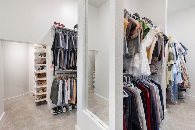 11111 Heartleaf Aster Way, Cypress, TX 77433 - walk in closet featuring carpet