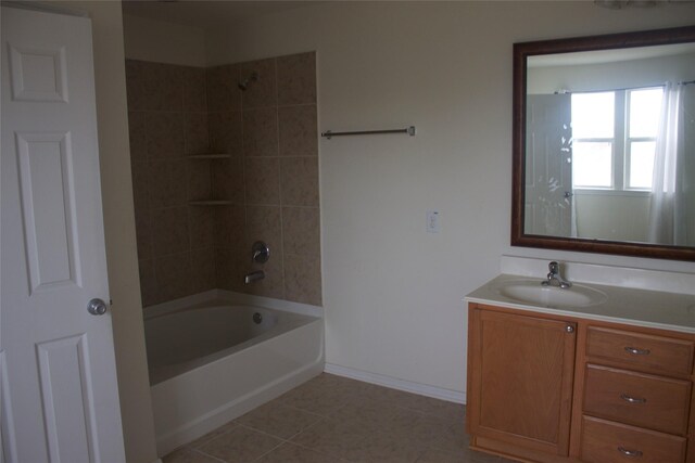26350 Riley Glen Dr, Richmond, TX 77406 - full bath with vanity, washtub / shower combination, and tile patterned flooring