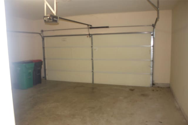 26350 Riley Glen Dr, Richmond, TX 77406 - garage featuring a garage door opener
