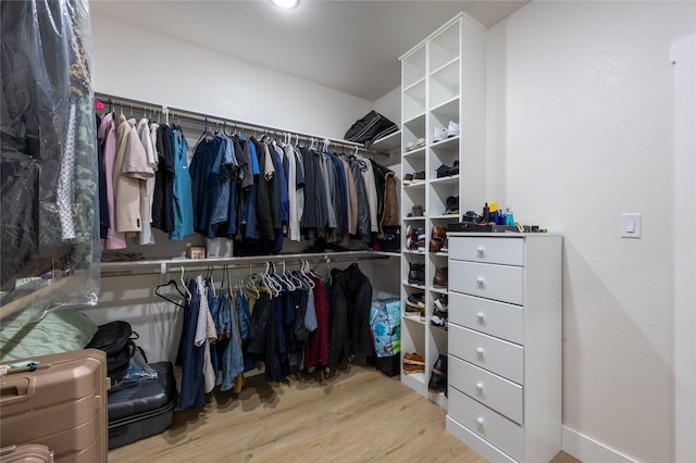 1000 Denson Allen Rd, Coldspring, TX 77331 - walk in closet with wood finished floors