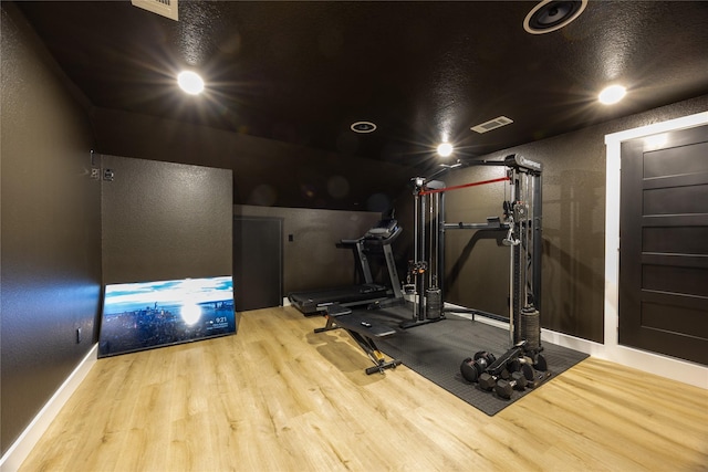 1000 Denson Allen Rd, Coldspring, TX 77331 - workout area with wood finished floors and baseboards