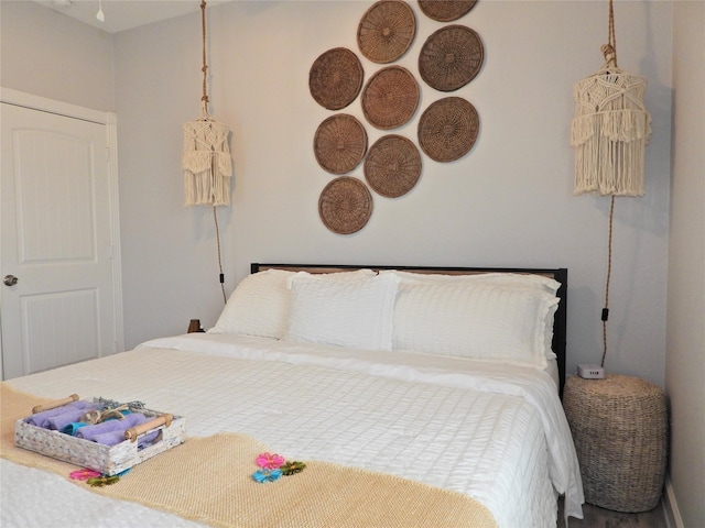 110 Pelican Pl, Surfside Beach, TX 77541 - bedroom with wood finished floors