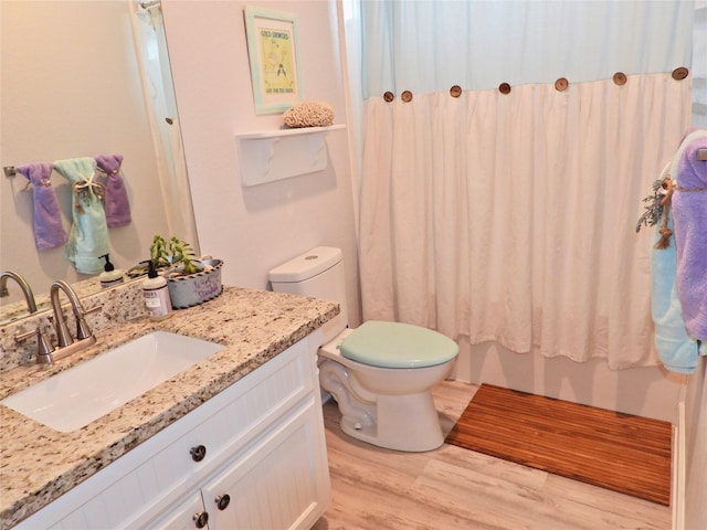 110 Pelican Pl, Surfside Beach, TX 77541 - full bath with vanity, wood finished floors, and shower / bath combination with curtain