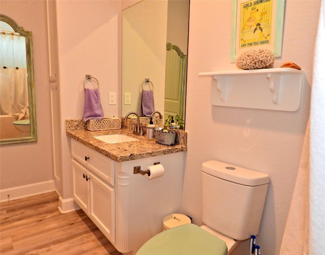 110 Pelican Pl, Surfside Beach, TX 77541 - bathroom with vanity and wood finished floors