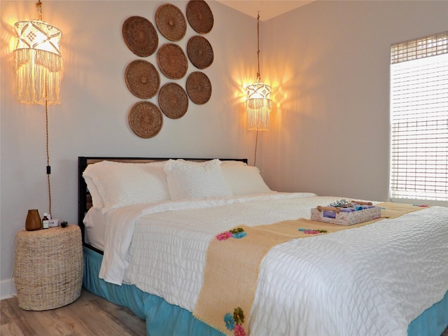 110 Pelican Pl, Surfside Beach, TX 77541 - bedroom featuring wood finished floors
