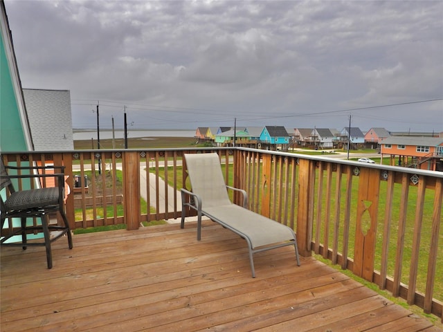 110 Pelican Pl, Surfside Beach, TX 77541 - wooden deck with a residential view