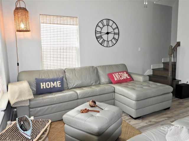 110 Pelican Pl, Surfside Beach, TX 77541 - living room with wood finished floors and stairs
