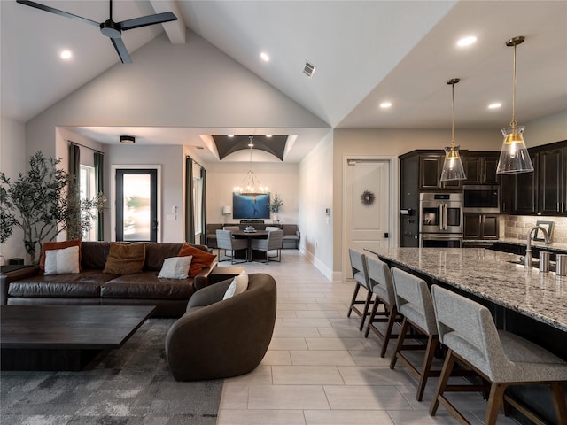 18114 Rainwater Creek Ln, Cypress, TX 77433 - living area featuring recessed lighting, beam ceiling, high vaulted ceiling, and a ceiling fan