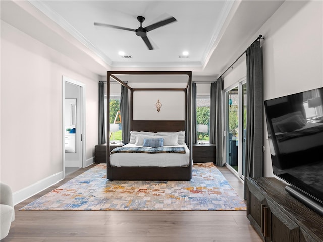 18114 Rainwater Creek Ln, Cypress, TX 77433 - bedroom featuring access to outside, multiple windows, ornamental molding, wood finished floors, and recessed lighting