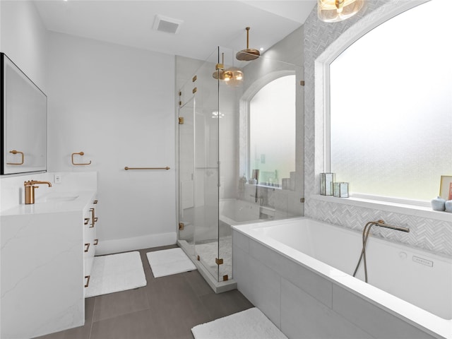 18114 Rainwater Creek Ln, Cypress, TX 77433 - bathroom featuring vanity, a stall shower, a tub, and tile patterned floors