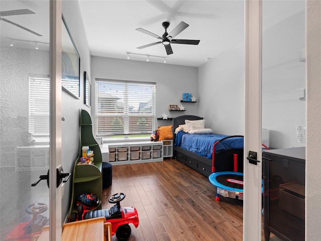 18114 Rainwater Creek Ln, Cypress, TX 77433 - bedroom featuring wood-type flooring and a ceiling fan