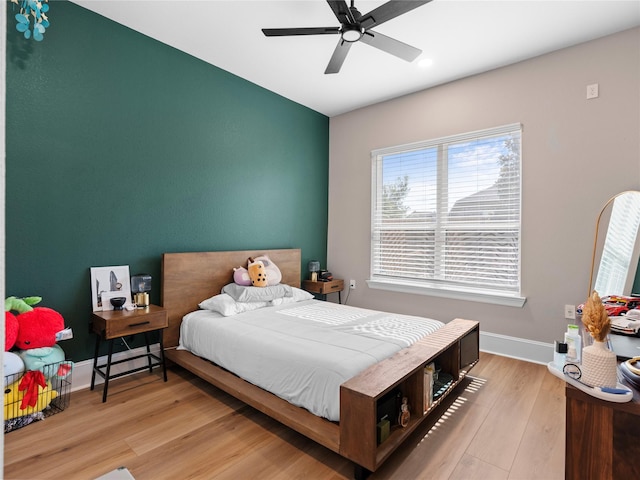 18114 Rainwater Creek Ln, Cypress, TX 77433 - bedroom with light wood-style floors, a ceiling fan, and recessed lighting