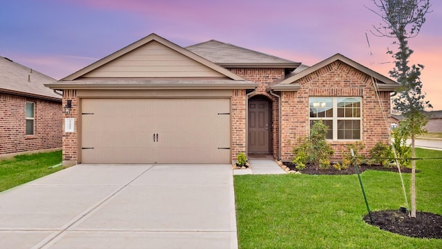 3227 Zephyr Park Ln, Katy, TX 77494 - single story home featuring an attached garage, concrete driveway, a lawn, and brick siding