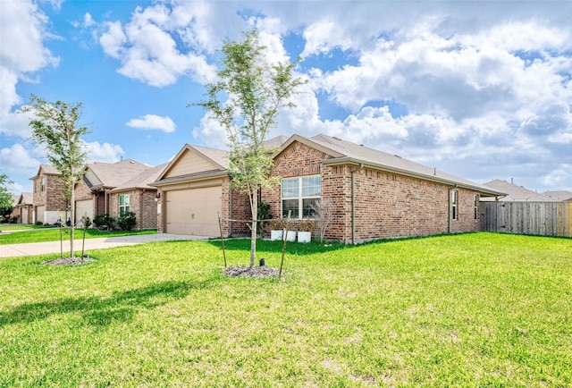 3227 Zephyr Park Ln, Katy, TX 77494 - ranch-style home with brick siding, an attached garage, and driveway