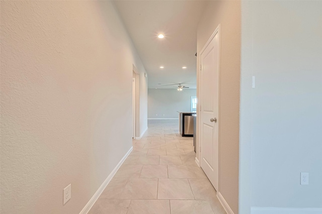 3227 Zephyr Park Ln, Katy, TX 77494 - hallway with recessed lighting and light tile patterned floors
