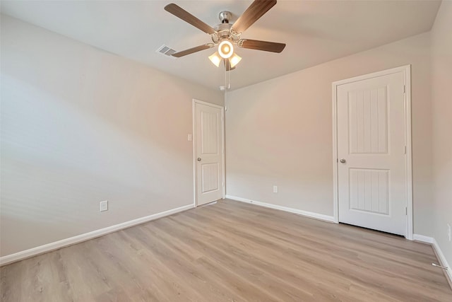 3227 Zephyr Park Ln, Katy, TX 77494 - unfurnished bedroom with light wood-style floors and a ceiling fan