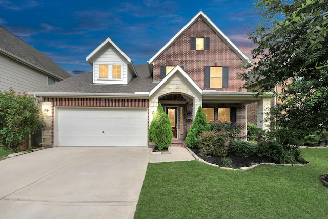 2714 Birchwood Meadow Ct, Katy, TX 77494 - traditional-style home with brick siding, concrete driveway, a lawn, and a garage