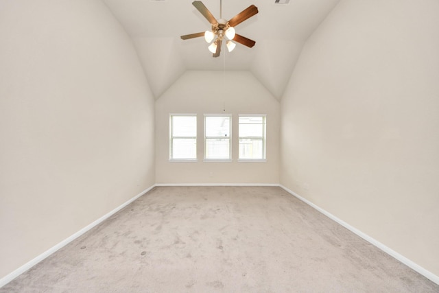 2714 Birchwood Meadow Ct, Katy, TX 77494 - spare room with ceiling fan, light colored carpet, and vaulted ceiling