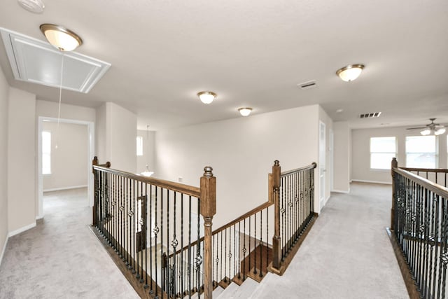 2714 Birchwood Meadow Ct, Katy, TX 77494 - hallway with attic access, carpet, and an upstairs landing
