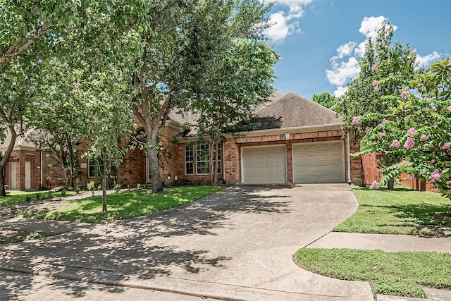 6507 Pinewood Trace Ln, Houston, TX 77041 - view of front of home with a garage, brick siding, driveway, and a front yard