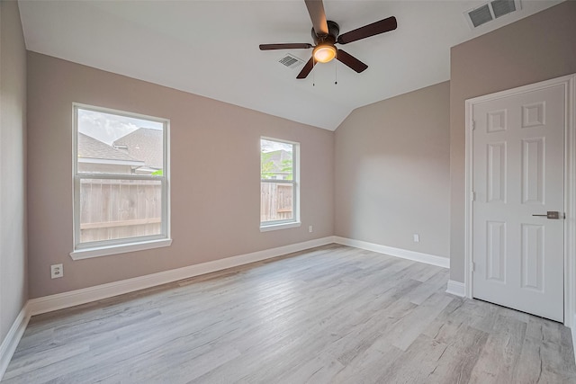 6507 Pinewood Trace Ln, Houston, TX 77041 - empty room featuring light wood-style floors, a ceiling fan, and lofted ceiling