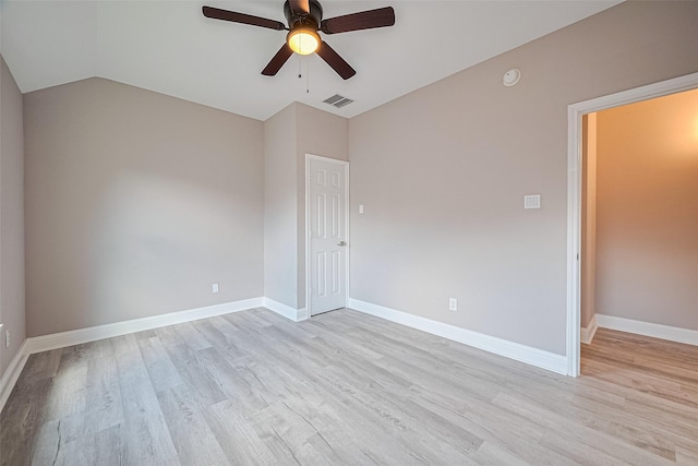 6507 Pinewood Trace Ln, Houston, TX 77041 - spare room featuring light wood finished floors, vaulted ceiling, ceiling fan, and a smoke detector