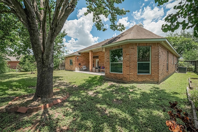 6507 Pinewood Trace Ln, Houston, TX 77041 - rear view of property with brick siding, a patio, and a shingled roof