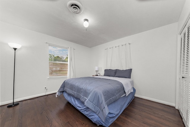 2801 John St, La Marque, TX 77568 - bedroom featuring wood finished floors and baseboards