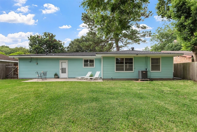 2801 John St, La Marque, TX 77568 - back of house featuring a patio and a fenced backyard