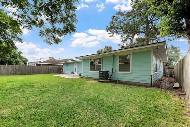 2801 John St, La Marque, TX 77568 - back of house with a patio area and a fenced backyard