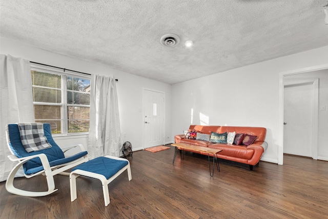 2801 John St, La Marque, TX 77568 - sitting room with wood finished floors and a textured ceiling